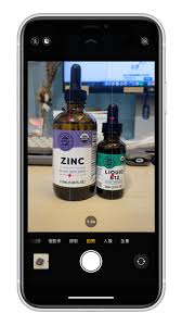 如何在苹果iPhone上开启九宫格构图功能